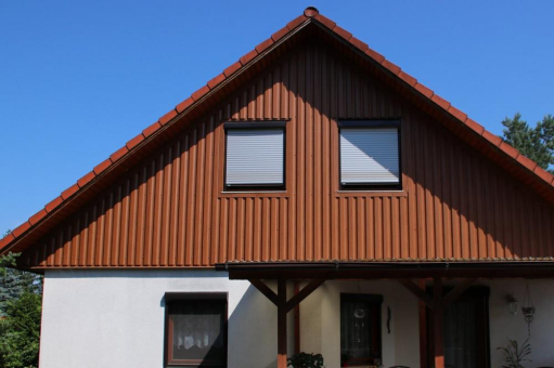 Fassade wie aus Holz – nur pflegeleichter!