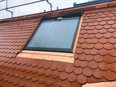 Denkmalgerechte Dachsanierung im historischen Münchner Haidhausen setzt auf topSwing Dachfenster von LACKER